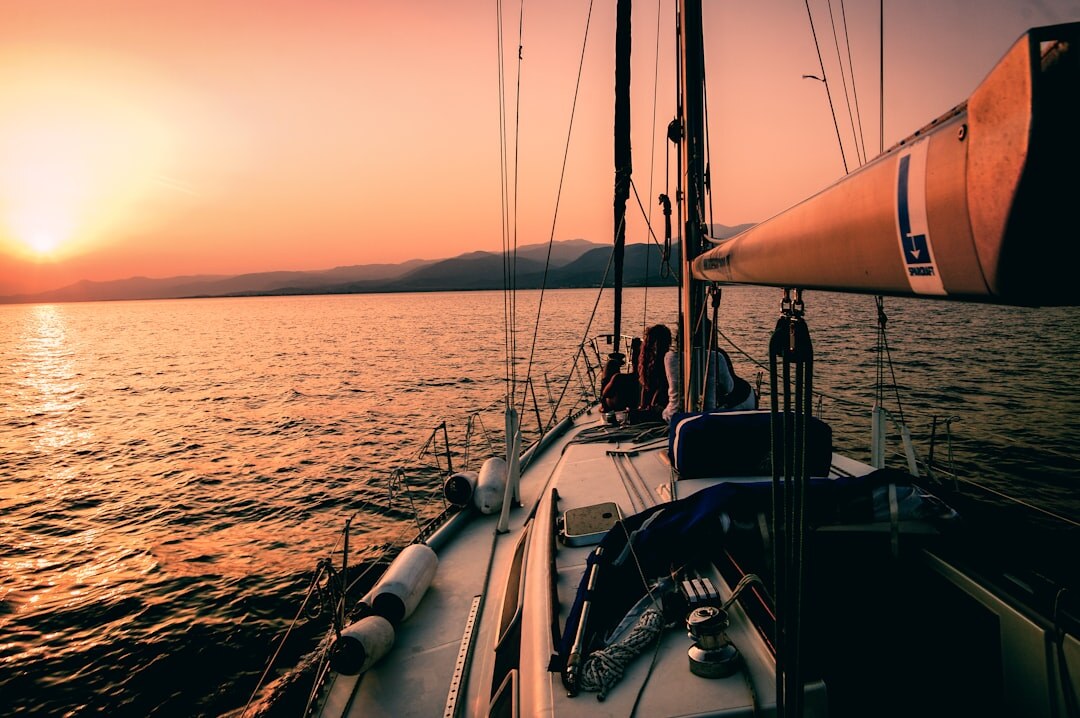 Sailboats racing during a regatta near Punta del Este at sunset